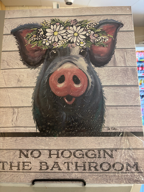No hoggin' the bathroom sign with a pig wearing flowers